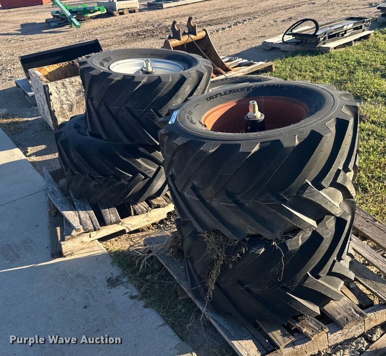 (5) skid steer tires and wheels  - EU6150