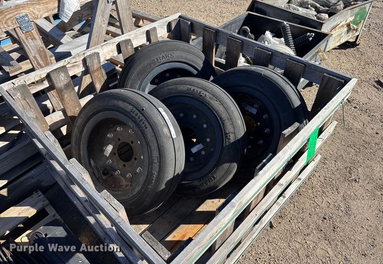 (4) 25.5x8x14 tires and wheels - EU6194