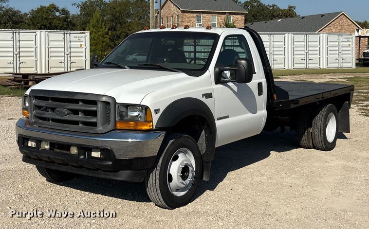 1999 Ford F450 flatbed truck - EA7596