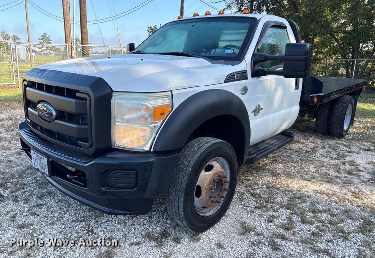 2014 Ford F550 Super Duty XL flatbed truck - EU7038