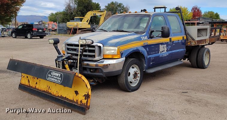 1999 Ford F550 Super Duty flatbed truck - IP9724