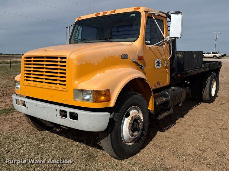 1999 International 4700 flatbed truck - EP0796