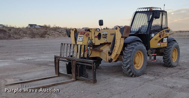 2004 Caterpillar TH560B telehandler - YA1502
