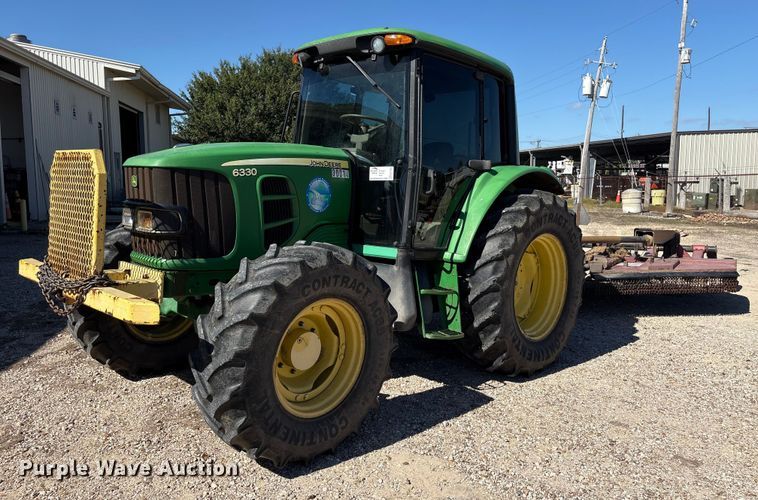 2010 John Deere 6330 MFWD tractor - EA7054