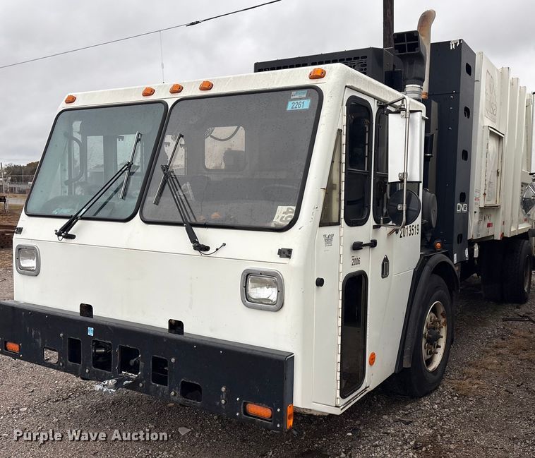 2013 Crane Carrier Low Entry refuse truck - EV2561