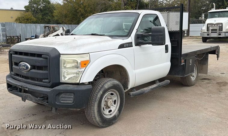 2012 Ford F350 Super Duty flatbed pickup truck - DX5892