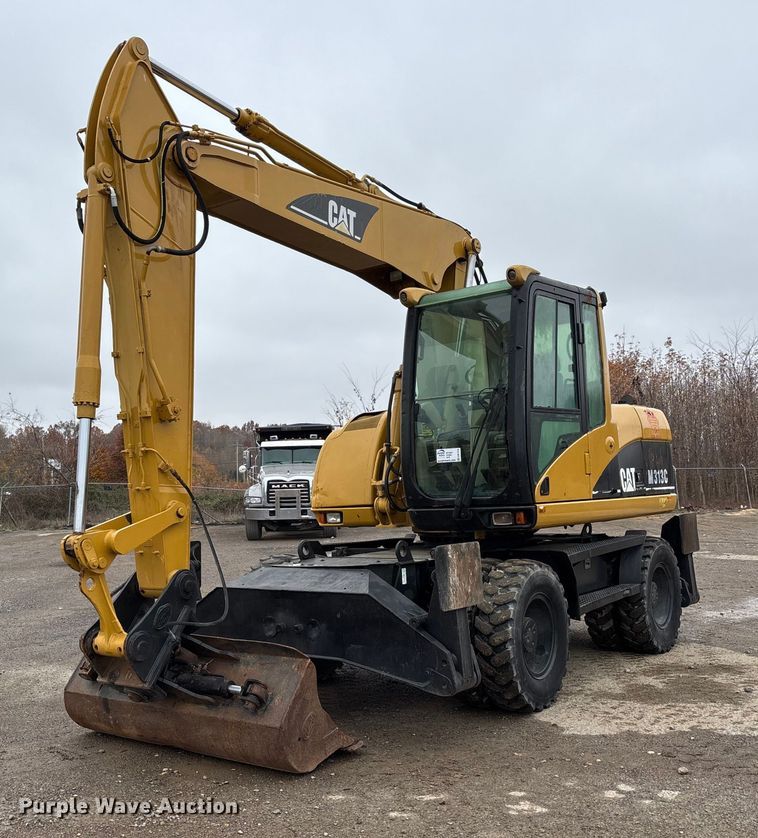 2005 Caterpillar M313C wheeled excavator - DW7310