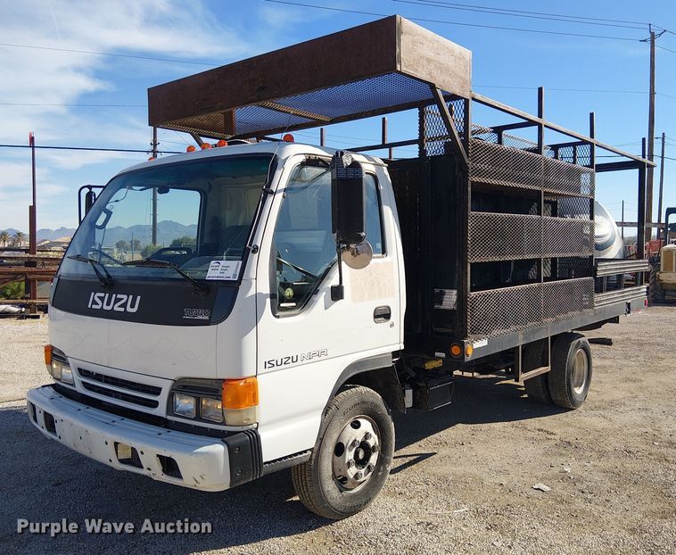 2005 Isuzu NPR flatbed truck - EE5024