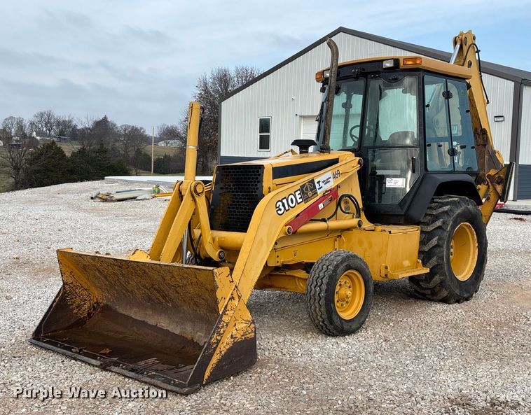1999 John Deere 310E backhoe - ED2444