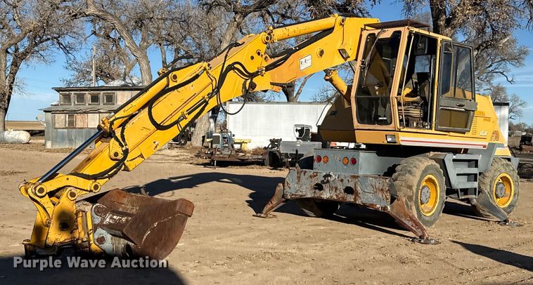 1999 Badger 1085D wheeled excavator - EP2719