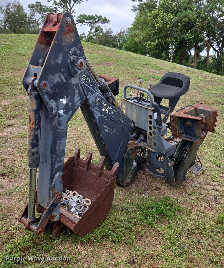 New Holland 609 skid steer backhoe - DU2583