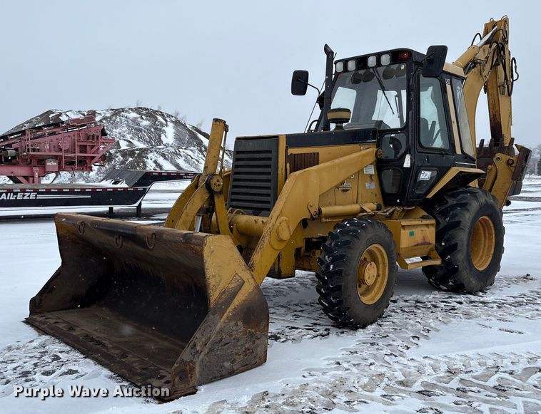 1996 Caterpillar 446B backhoe - FK1053