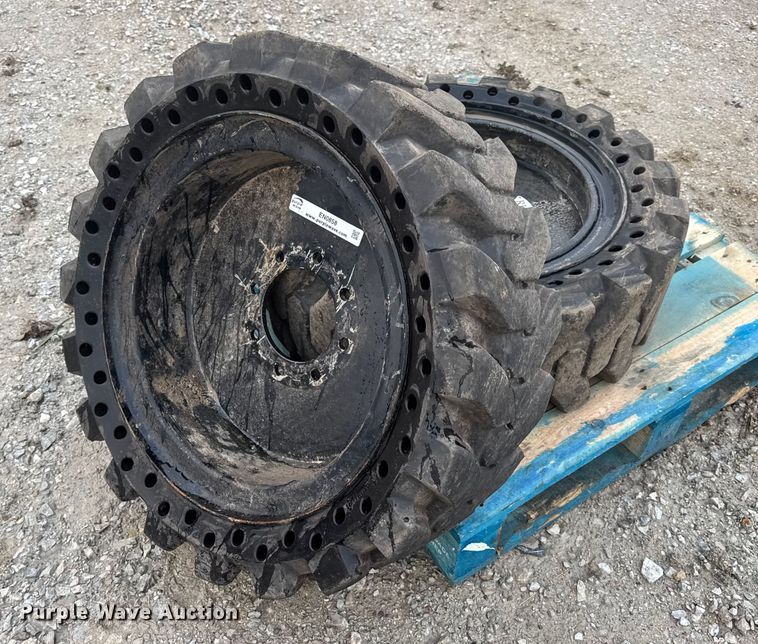 (2) Dobermann 33X12-20 skid steer tires and wheels - EN0858