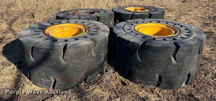 (4) 29.5x25 Brawler Solid Flex HPS tires and wheels - OE9297