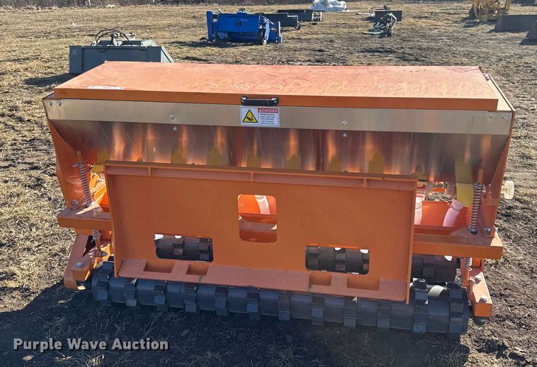 2025 Wolverine skid steer seeder - EN0232