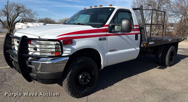 2004 Ford F350 Super Duty flatbed pickup truck - EU4099