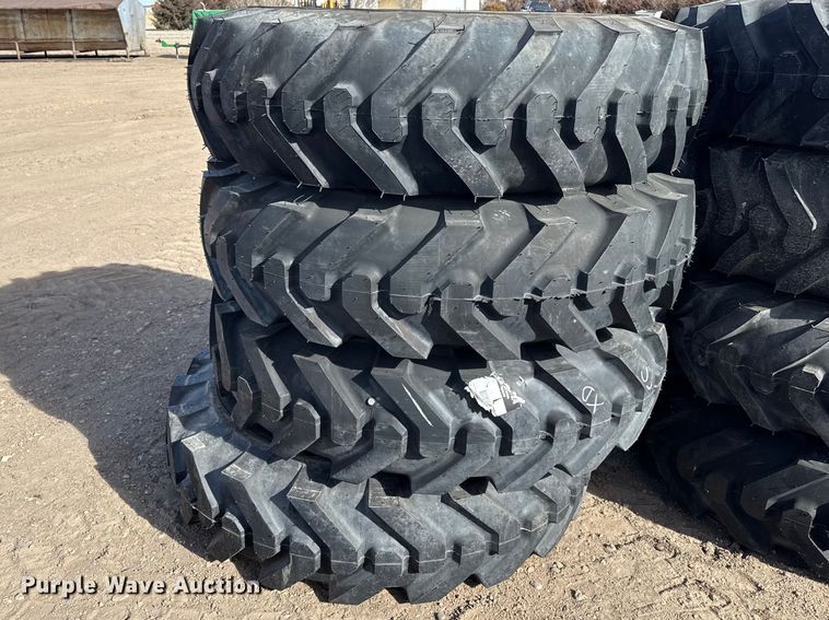 (4) 13.00-24 tires and wheels - DZ5052