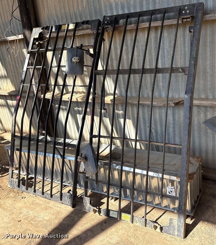 (2) Caterpillar cab guards - DQ4318