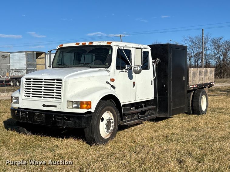 2001 International 4700 dump flatbed truck - FG0092