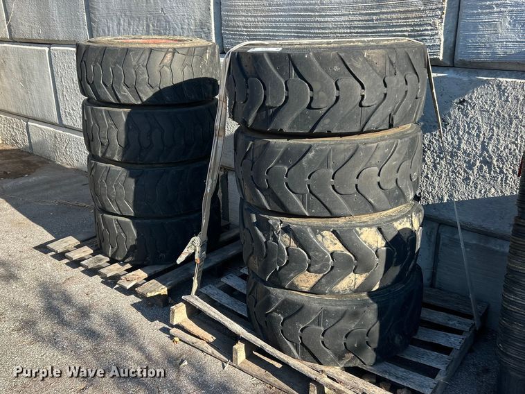 (8) Bobcat 12-16.5 tires and wheels - FC5087