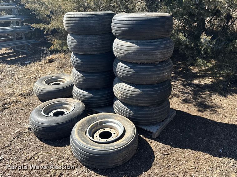 (13) 11L-15 tires and wheels - FB7031