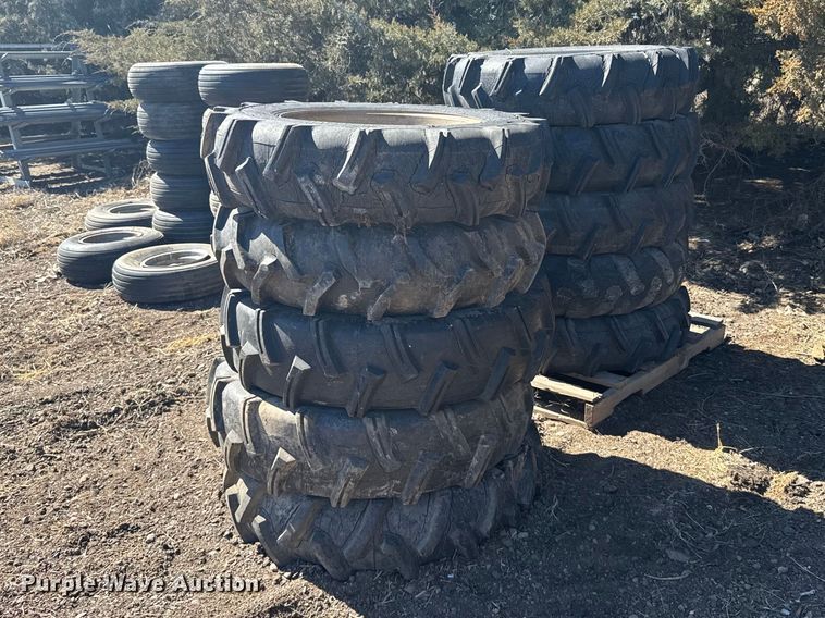 (8) 11-24.5 tires and wheels - FB7032