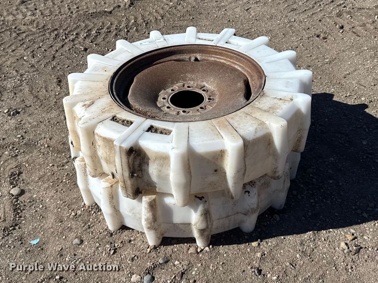 (2) 11.2-24 plastic pivot tires - FB7078