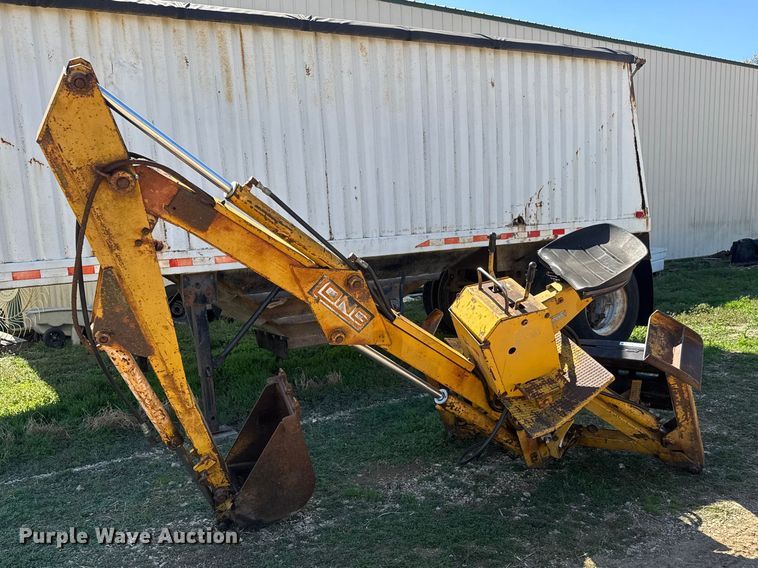 Long 1199 A skid steer backhoe - ET1675