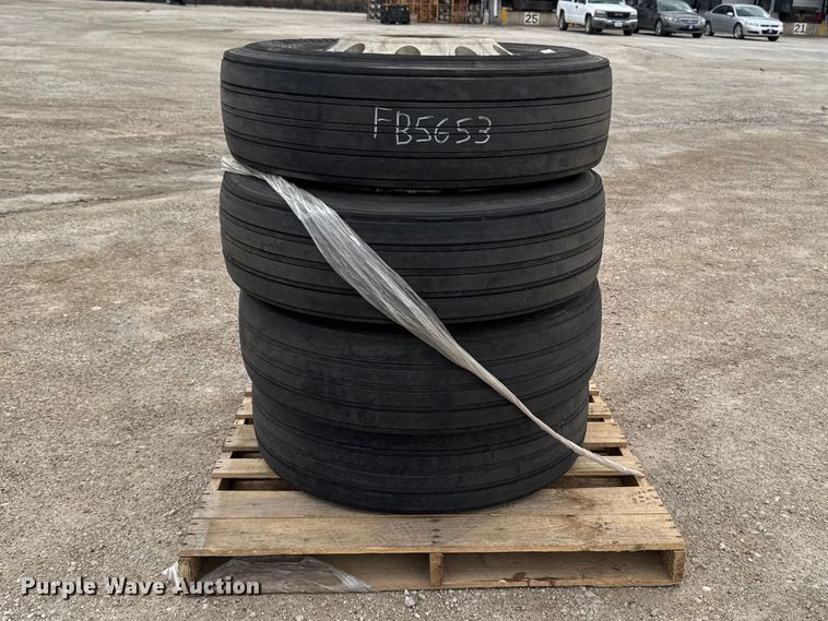 (4) Bridgestone 295/75R22.5 tires and wheels - FB5653