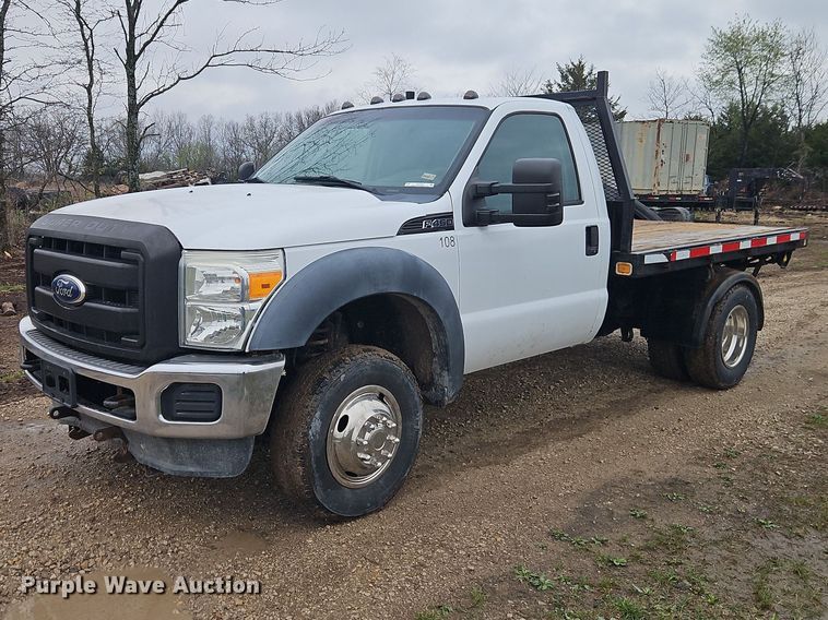2011 Ford F350 flatbed pickup truck - EO7194