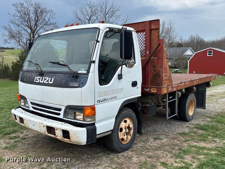 1999 Isuzu NPR dump flatbed truck - FB3343