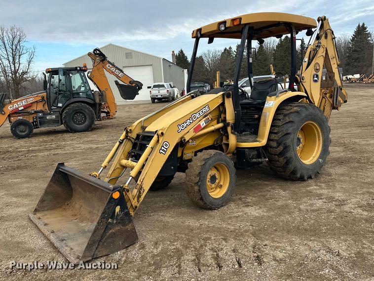 2011 John Deere 110TLB backhoe - FK1854