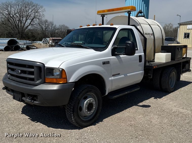 1999 Ford F550 flatbed truck - EV7697