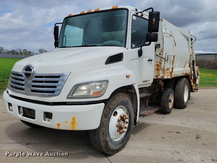 2010 Hino 338 refuse truck - DZ7035