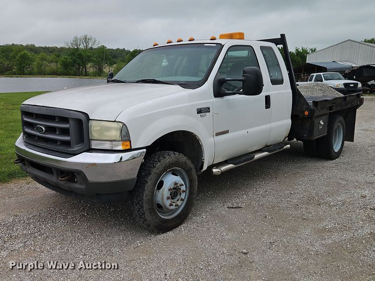 2004 Ford F450 Super Duty Ext. Cab flatbed pickup truck - EO7254