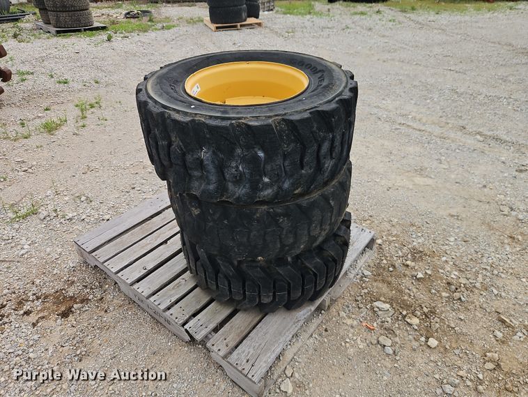 (3) 12-16.5 tires and wheels - EO7269