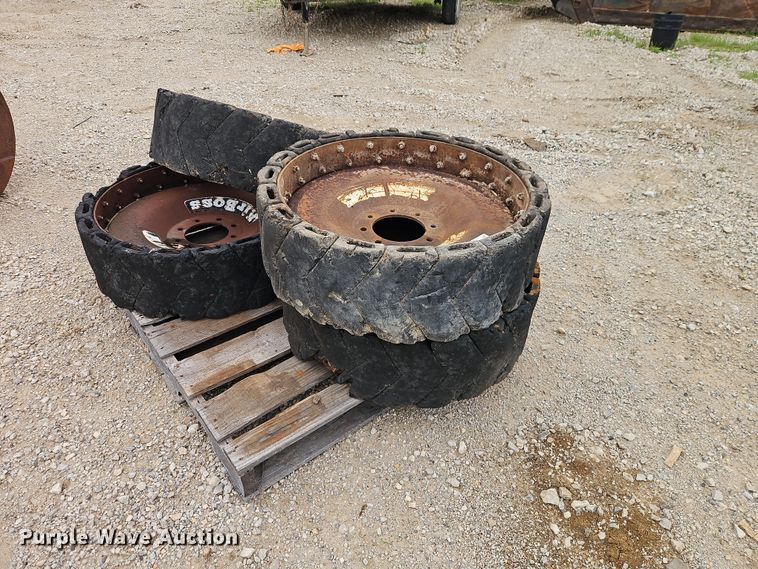 (4) Air Boss skid steer tires - EO7270