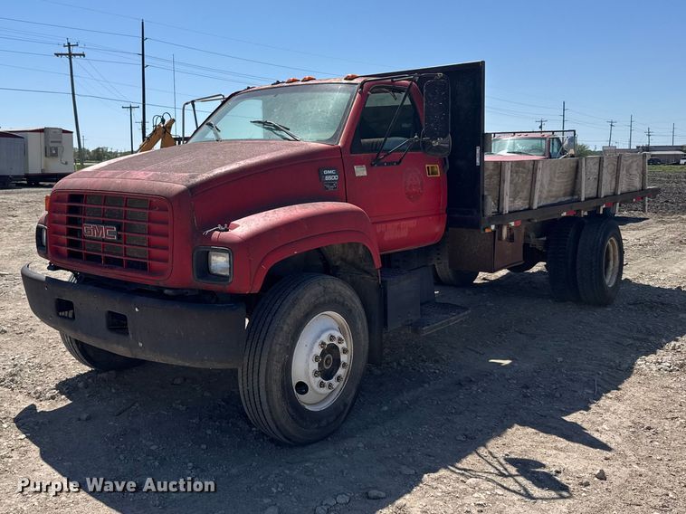1997 GMC C6500 flatbed truck - FB7245