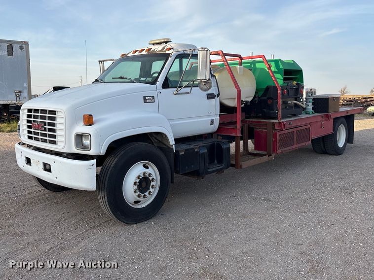 1999 GMC C7 flatbed truck - FC2156