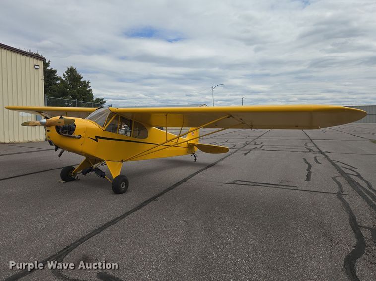 1945 Piper Cub J3C-65 airplane - EB1427