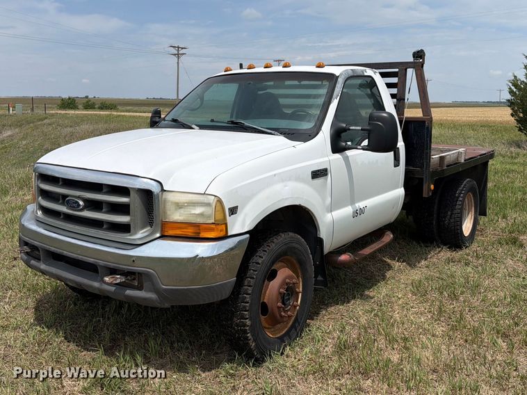 1999 Ford F450 Super Duty flatbed truck - NA9400