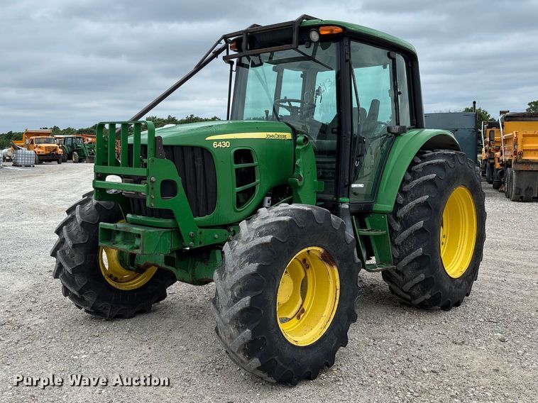 2009 John Deere 6430 MFWD tractor - FC5815