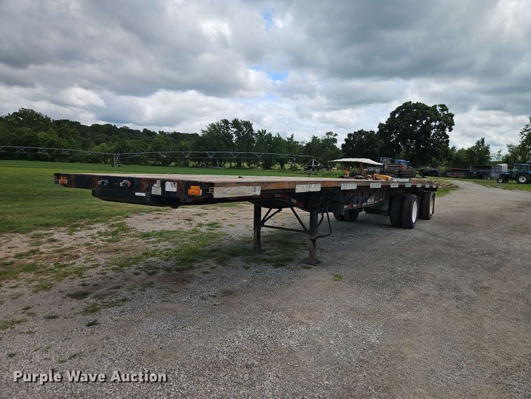 1999 Transcraft TL-2000 flatbed trailer - EO8542