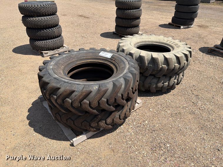 (4) 14.00-24TG tires - DQ0053