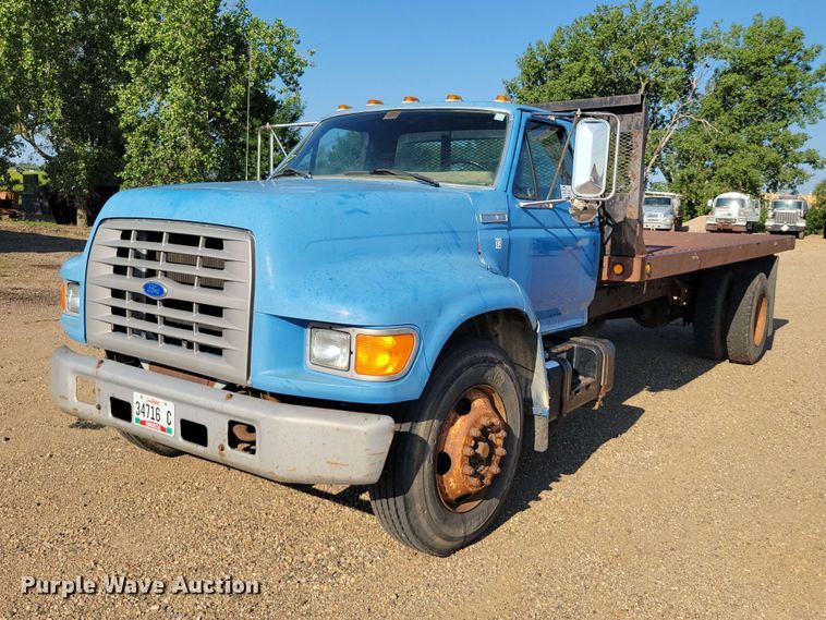 1995 Ford F700 dump flatbed truck - EE1145