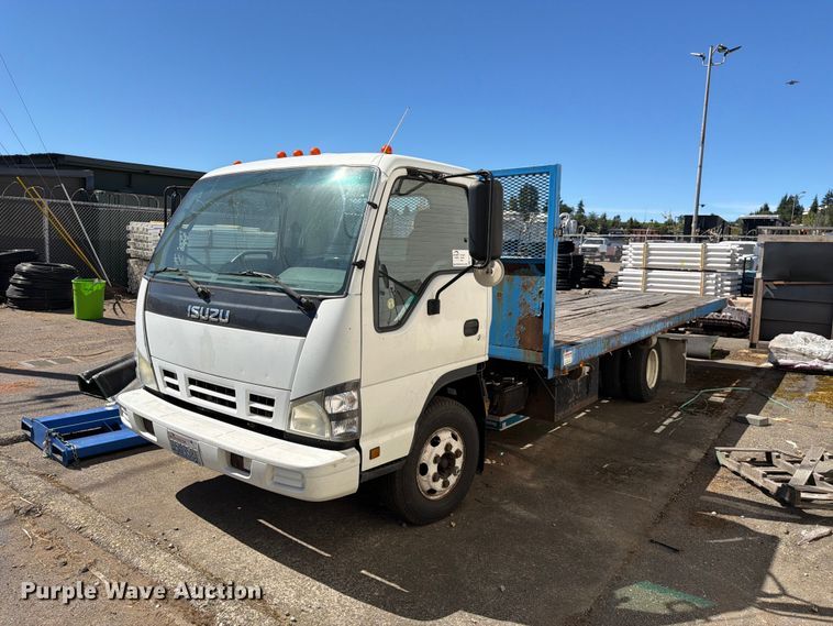 2006 Isuzu NPR flatbed truck - FK4548