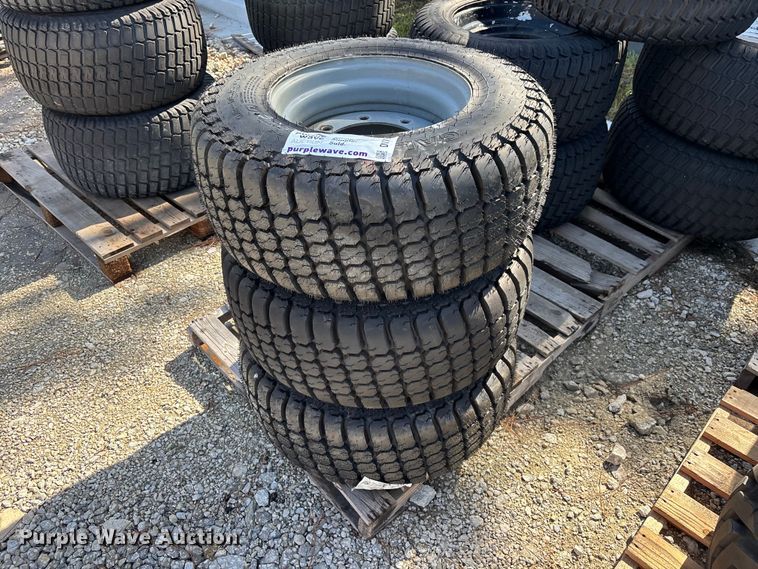 (3) 12-16.5 tires and wheels - DV7253