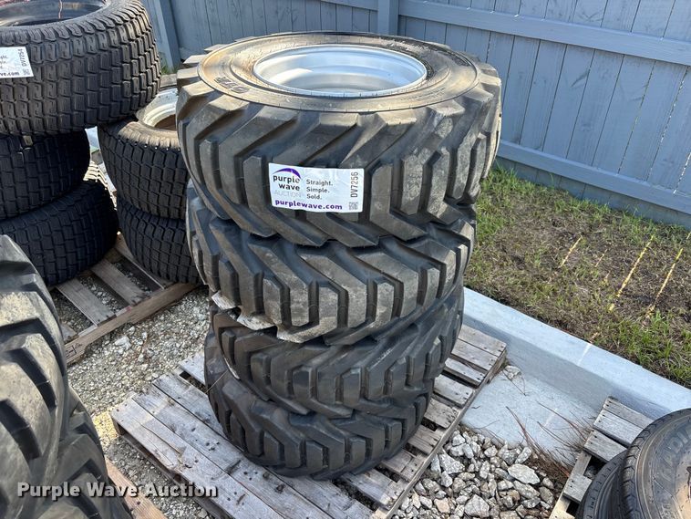 (4) 12-16.5 tires and wheels - DV7256