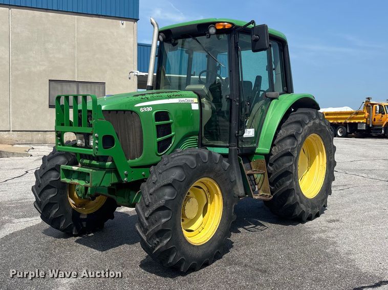 2009 John Deere 6330 MFWD tractor - FG0581