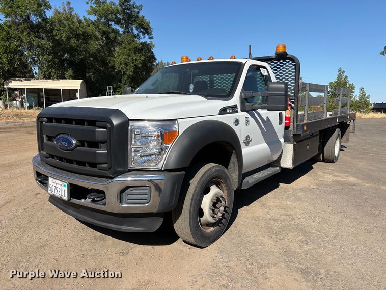 2014 Ford F550 Super Duty flatbed truck - EA0001